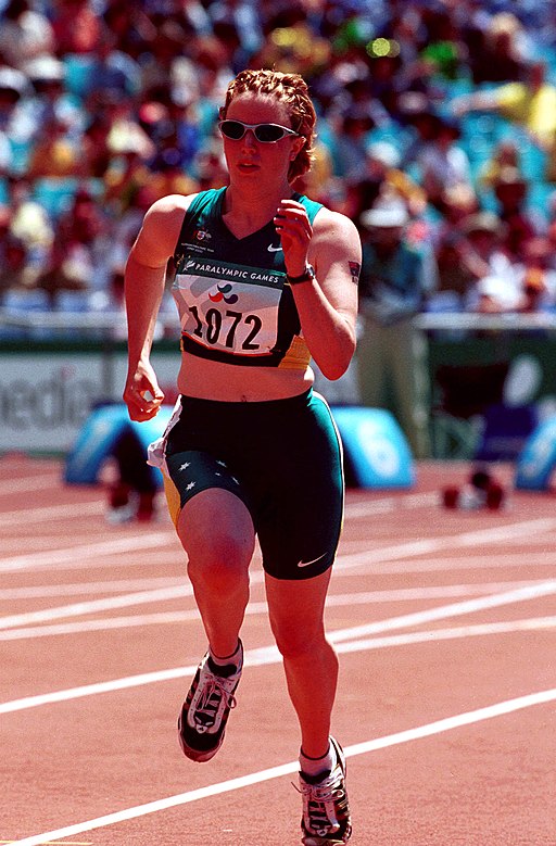 261000 - Athletics track 100m T38 Alison Quinn gold action - 3b - 2000 Sydney race photo