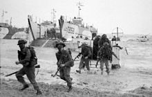 Infantry of the 50th (Northumbrian) Infantry Division run ashore near La Riviere on 6 June. 50th division.jpg