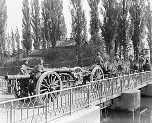 60 pounder gun advancing in Flanders 22-09-1918 IWM Q 6996.jpg