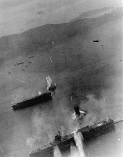 Aircraft carriers under attack at Kure 19 March 1945.jpg