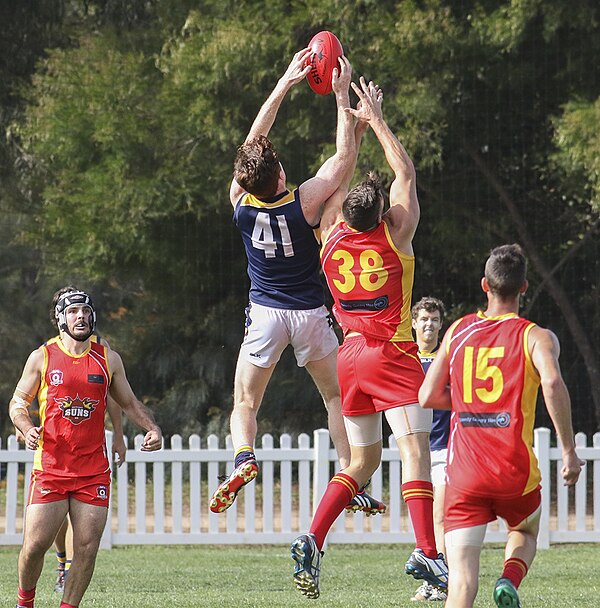 Player gains possession in a marking contest