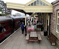 Bench and picnic bench on platform 1, Winchcombe railway station-geograph-4583566-by-Jaggery.jpg