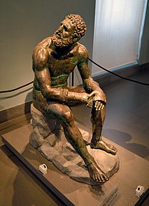 <i>Boxer at Rest</i> Hellenistic Greek bronze sculpture of a sitting nude boxer at rest