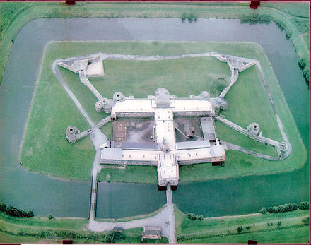 Modern aerial photograph of Fort Breendonk, from the north. The earth which originally covered the Fort's structure was removed by the prisoners under German supervision