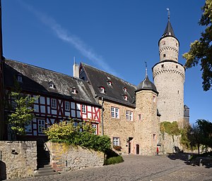 Half-timbered building of the old castle (upper castle) with the old district court (center) and the old keep, now called the Witches Tower