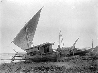 A kora-kora from Halmahera, Maluku Islands (c. 1920) with a tanja sail