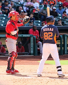 A catcher for the Mexican League's Rojos del Aguila de Veracruz uses his glove to signal the pitcher for an intentional walk. Catcher signals for intentional walk 2014.jpg