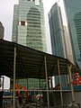 Demolición del edificio antiguo. The Sail@Marina Bay puede ser vista en el fonfo.