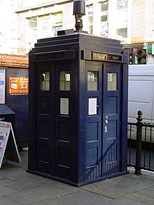 A police box outside Earl's Court tube station in London, built in 1996 and based on the 1929 Gilbert Mackenzie Trench design Earls Court Police Box.jpg