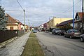 Čeština: Východní pohled do ulice Družstevní v Okříškách, okr. Třebíč. English: East view of Družstevní street in Okříšky, Třebíč District.