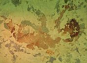Bevarade putsfragment av amorin från Ekotemplet