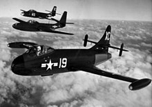 An F6U (foreground) with its competitors FH Phantom (middle) and F2H Banshee (rear). F6U FH and F2H in flight.jpg