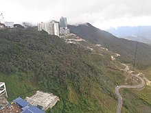 Road leading to Amber Court and Ion Delemen in 2016. The number on the mechanical penthouse is the old resort phone number. Genting Trip (30978915893).jpg