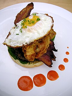 Hangtown fry American egg, oyster, and bacon dish