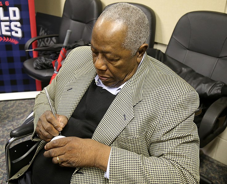 File:Hank Aaron signs an autograph before World Series Game 2. (29957050854).jpg