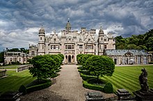 Harlaxton Manor, England, a 19th-century meeting of Renaissance, Tudor and Gothic architecture produced Jacobethan - a popular form of historicist mansion architecture. Harlaxton College.jpg