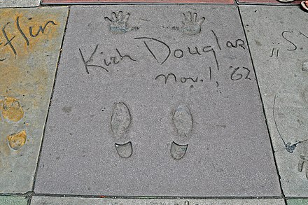 His handprints and footprints at Grauman's Chinese Theatre