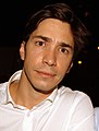 Justin Long, interprete di Nathan Bratt