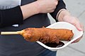 US variation (no bread, but baked corn dough) Main category: Corn dogs