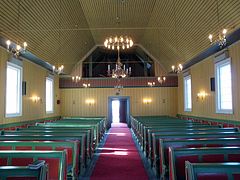 Inside Kautokeino Church, facing the church organ and the public entrance/exit.
