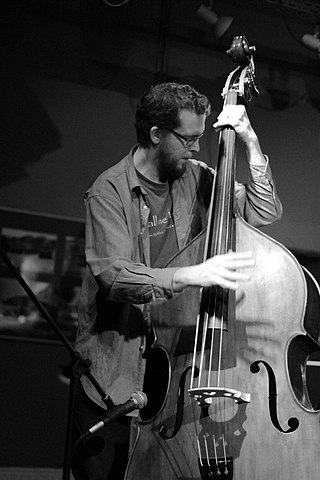 <span class="mw-page-title-main">Dominic Lash</span> English double bassist and film theorist