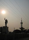 Tower of Limete and OPatrice Lumumba statue in Kinshasa