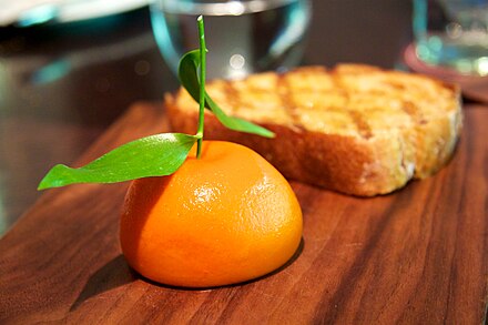Meat fruit, a chicken liver mousse created to look like a mandarin orange, served in Blumenthal's Dinner restaurant in London