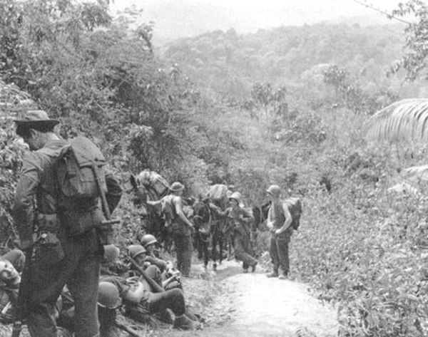 Marauders rest during a break along a jungle trail near Nhpum Ga.