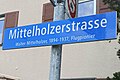 image=https://commons.wikimedia.org/wiki/File:Mittelholzerstrasse_Strassenschild.jpg