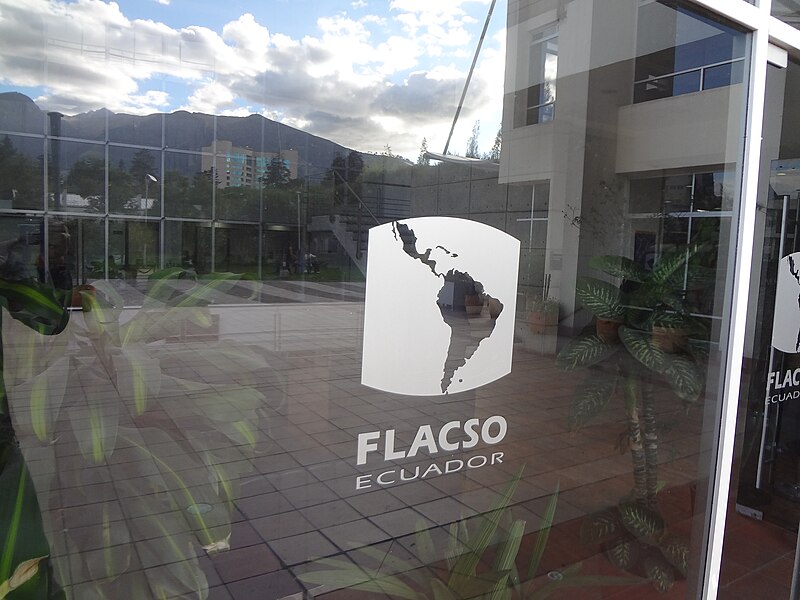 File:Modern entrance at the One of the main buildings on the FLACSO, Ecuador main campus with a view of Pichincha Volcano.jpg