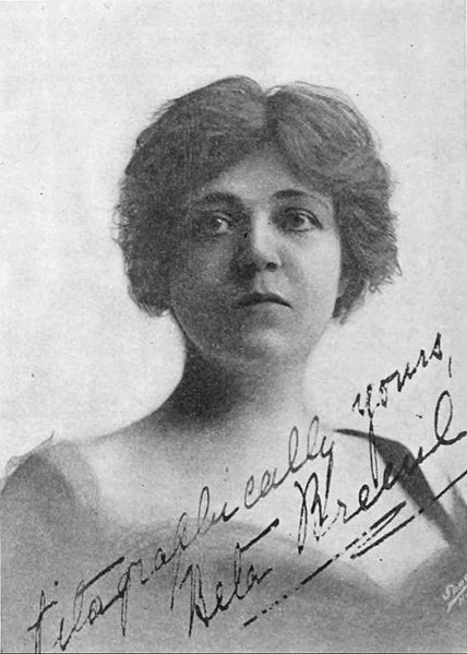 Beta Breuil, scenario editor for Vitagraph Studios, in a photograph published in 1912: The autograph is signed "Vitagraphically yours."