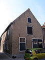 This is an image of rijksmonument number 7579 A former warehouse at Nieuwstraat 11, Ameide.