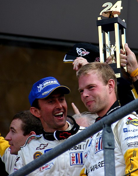 File:Oliver Gavin, Olivier Bereta & Jan Magnussen celebrate their GTS class win on the podium at the 2004 Le Mans (50884349326).jpg