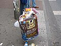 Overflowing garbage bin.