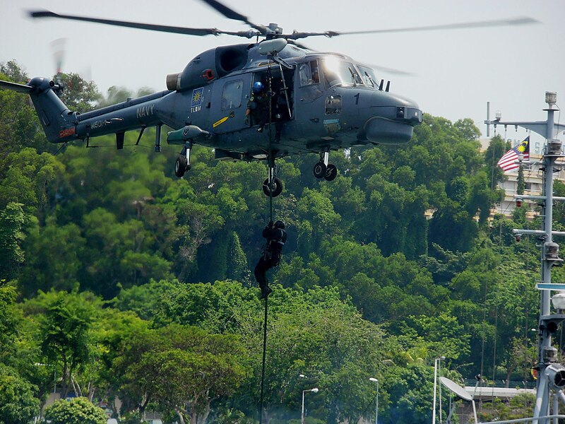 File:PASKAL Maritime Counter-Terrorism strike team member using the rappeling from Super Lynx helicopter while boarding Tunda Satu naval trawler during 82nd Anniversaries of Royal Malaysian Navy.JPG