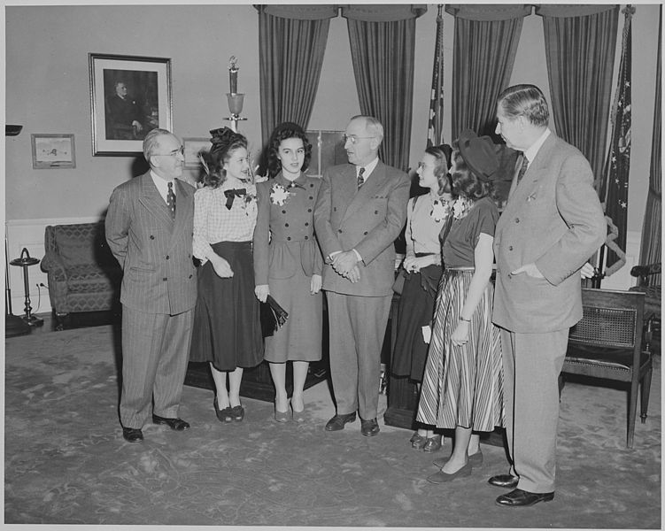 File:President Truman greets winners of the Voice of Democracy contest. L to R, Dr. John W. Studebaker, Janet Gerster... - NARA - 199641.jpg