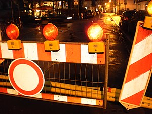 Road barrier in Marburg for pumping tubes, water in a cellar caused by rising river Lahn after January snowmelt and rain in Germany 2018-01-04.jpg