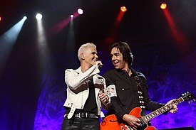 Marie Fredriksson and Per Gessle performing at the Sydney Entertainment Centre on 17 February 2012. Roxette (6891043653).jpg