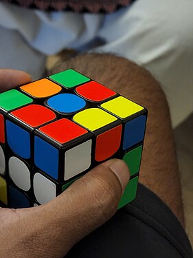 Boy yet to finish solving Rubik's cube