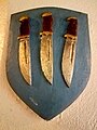 Shield showing three flaying knives, symbol of St. Bartholomew.jpg
