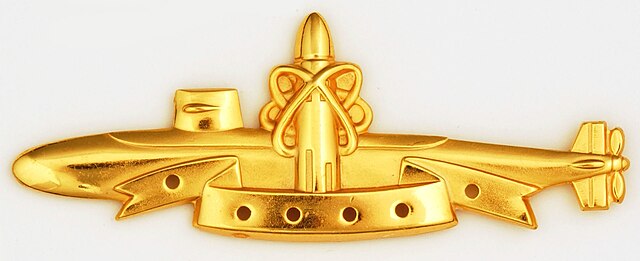 SSBN Deterrent Patrol insignia, in silver and gold, awarded by the US Navy to sailors who completed at least one SSBN patrol.