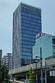 TV Asahi EX Tower in 1 Nishi-Azabu neighboring Roppongi, viewed from Roppongi Hills, over the Roppongi-dori (Roppongi street).