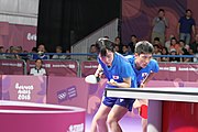 Deutsch: Tischtennis bei den Olympischen Jugendspielen 2018; Tag 9, 15. Oktober 2018; Mixed, Finale, Mixed-Doppel – Miu Hirano & Tomokazu Harimoto (JPN) gegen Sun Yingsha & Wang Chuqin (CHN) 1:3 English: Table tennis at the 2018 Summer Youth Olympics at 15 October 2018 – Mixed Final, Mixed-Double – Miu Hirano & Tomokazu Harimoto (JPN) Vs Sun Yingsha & Wang Chuqin (CHN) 1:3