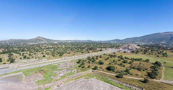 Pyramid of the Moon and Avenue of the Dead, UNESCO World Heritage Site of Teotihuacan (Place of the Gods in Nahuatl), a pre-Columbian Mesoamerican city located in the State of Mexico, Mexico. The pyramid was constructed between 200 and 450 AD with a slope in front of the staircase that gives access to the Avenue of Dead, whereas the platform atop the pyramid was used to conduct ceremonies in honor of the Great Goddess of Teotihuacan.