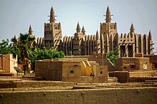 The Great Mosque of Djenné in Mali is the largest mud brick building in the world. (32931594225).jpg