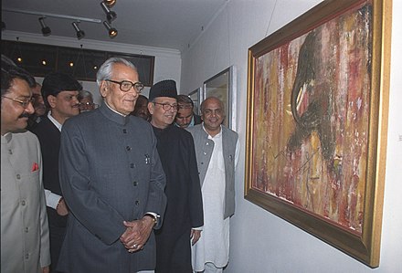 The Vice President of India, Shri Bhairon Singh Shekhawat looking at painting works by the former Prime Minister Shri V. P. Singh, after inaugurating the exhibition, in New Delhi on 14 February 2006