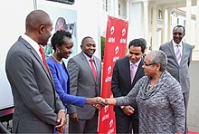 Topyster Muga greeting Margaret Kenyatta at Airtel Event Topyster Muga at Airtel Event.jpg