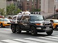 An FJ Cruiser with a third axle.