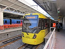 Manchester Airport railway and tram station Tram 3074 at Manchester Airport (2).jpg