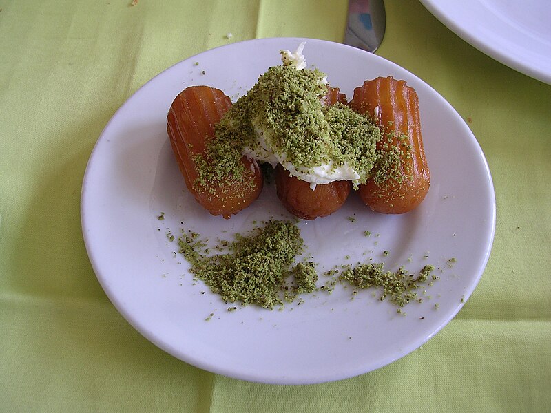 File:Tulumba with kaymak and pistachio.jpg